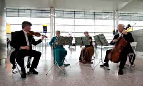 Musicians inside the redeveloped T2 building at Heathrow on 4 June 2014