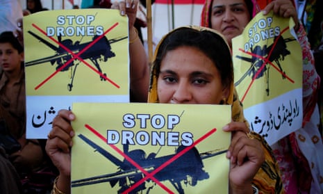 Pakistan women take part in a rally against the US drone strikes.