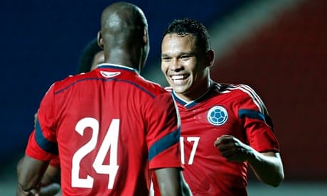 Colombia's Carlos Bacca celebrates his goal against Senegal with his team-mate Victor Ibarbo. 