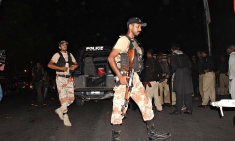 Pakistani rangers patrol outside Karachi airport following an attack by gunmen.