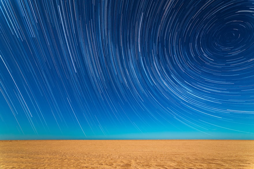 Astronomy Photographer of the Year 2014: Star Trails on the Beach by Sebastián Guillermaz (Argentina)