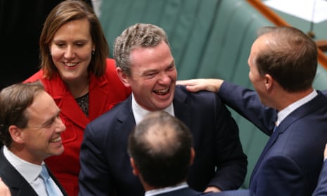 BEFORE: Smiles and back slaps for the Government as the carbon tax repeal bills pass in the House of Representatives on June 26.