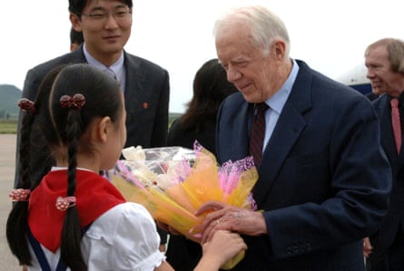 Jimmy Carter at Pyongyang airport on his return to North Korea in 2010 to secure the release of a jailed American.
