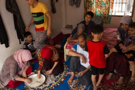 An extended family of ten Hazara asylum seekers from Afghanistan live together in a one room apartment in Cisarua, Indonesia