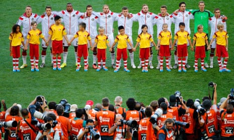 The German players line up on the pitch ready for their National Anthem.