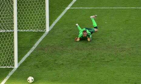A relieved Manuel Neuer watches the ball go past his upright.
