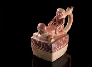 Pervian pottery vessel with handle, neck broken off,  with a couple engaged in anal intercourse fashioned on top