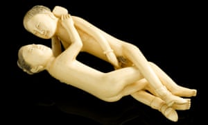 Far Eastern carved ivory statue, in the form of a copulating man and woman