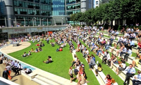 16 Jul 2014, London, England, UK --- London, United Kingdom. 16th July 2014 -- Office workers lunch outside in vast numbers in Paddington. -- The Met Office has issued a heatwave alert as temperatures soar to their highest of the year this weekend. The south-east could reach the low 30s Celsius (Mid-80s Farenheit) by Friday. --- Image by   brian minkoff/Demotix/Corbis British Isles City of Westminster England environment Europe Great Britain heat wave hot Inner London landscape London natural world office lunchtime Paddington paddington basin sun UK weather Western Europe webgalleryheatwave