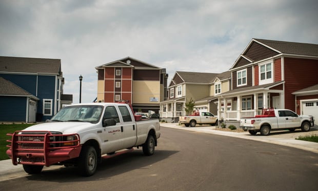 Trucks outside new homes rented by oil workers in Williston, North Dakota.