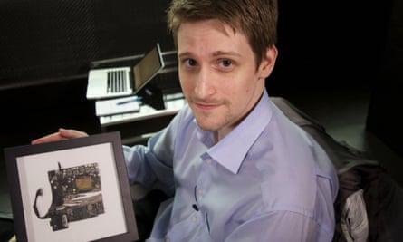 Edward Snowden with a fragment of the smashed laptop