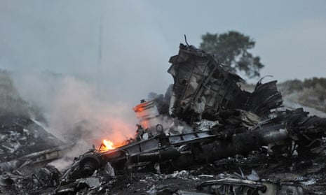 Flames amongst the wreckages of MH17. malaysia ukraine