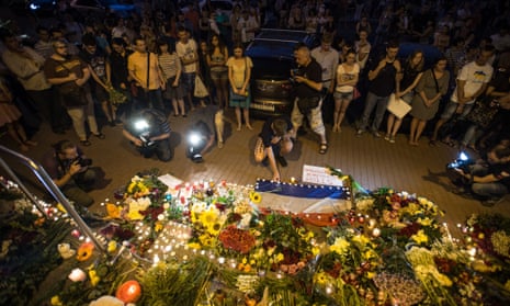 Hundreds of Kiev citizens brought flowers and candles to the Dutch Embassy in Kiev after Malaysian Airlines flight MH17, carrying 295 people, was shot down by a missile inside Ukrainian airspace.