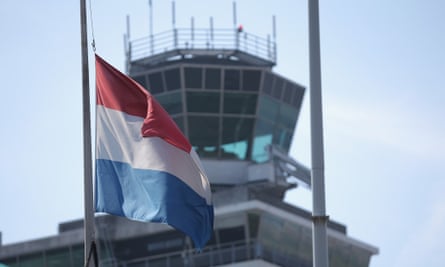 The Dutch flag flys at half-mast at Schiphol airport