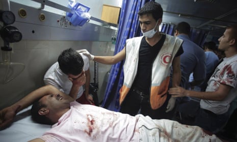 Wounded Palestinians in the emergency room of Shifa hospital in Gaza City, northern Gaza.