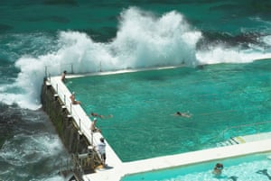 Perched on the edge of Bondi Beach, a wave breaks over the Icebergs pool in Sydney