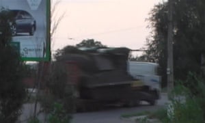 A still taken from a video made available by the Ukrainian Interior Ministry, purportedly showing a truck carrying a Buk missile launcher.