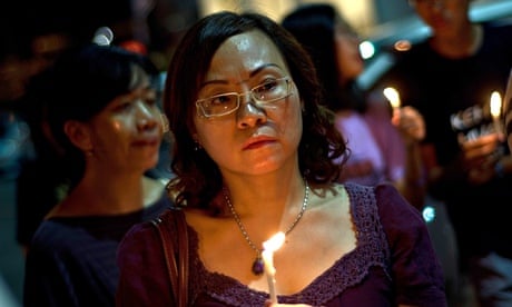 A candle-lit vigil in Kuala Lumpur for the victims of the MH17 crash