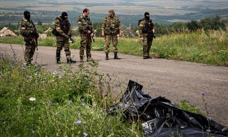 Armed separatists at MH17 crash site in Ukraine