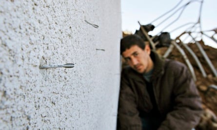 Flechette shell darts embedded in a wall in Gaza
