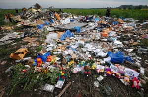 Flowers and mementos placed at the crash site of Malaysia Airlines Flight MH17 in the Donetsk region of Ukraine.