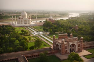 The Taj Mahal as the day's first tourists trickle through the gates