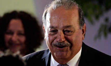 Mexican tycoon Carlos Slim arrives to attend the opening of the Soumaya museum in Mexico City