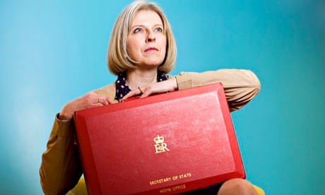 'Dedicated to the job': Theresa May with her Home office red box.
