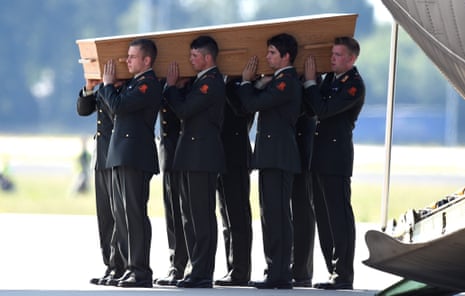MH17 coffin is unloaded