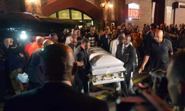 Pallbearers carry the casket of Eric Garner at Bethel Baptist Church.