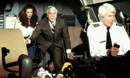 Leslie Nielsen with Julie Hagerty and Peter Graves in Airplane!