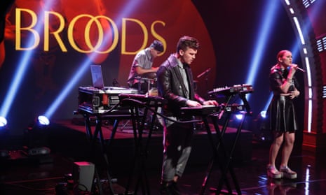 Broods, performing on Late Night with Seth Meyers in July 2014.