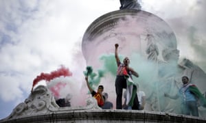 Paris: Pro-Palestinian demonstrators let off smoke cannisters making up the colours of the Palestinian flag, in Republique square.