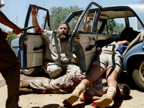 A member of South Africa's neo-Nazi Afrikaner Resistance Movement (AWB) begs for his life, Bophuthatswana, March 1994