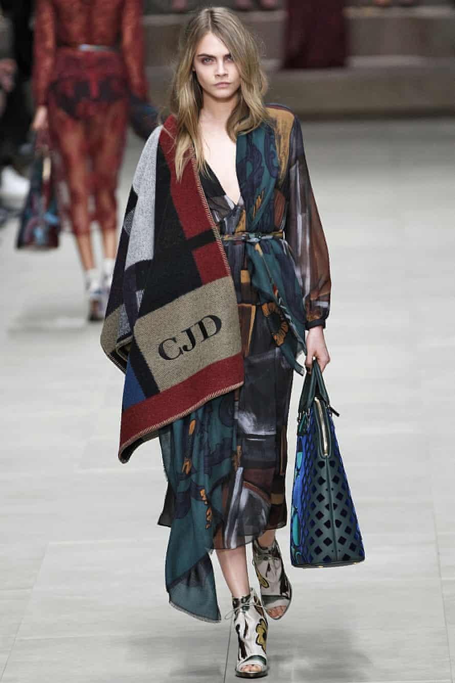 Cara Delevingne walks the runway at the Burberry Prorsum Ready to Wear Fall/Winter 2014-2015