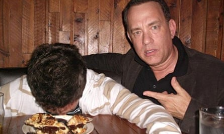 Yes, you've just been photobombed by Tom Hanks.