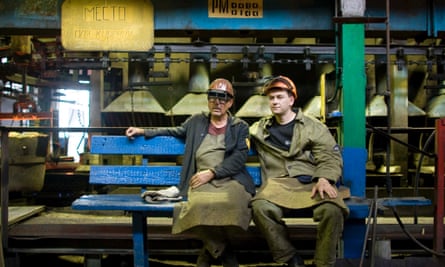 Workers rest as they work in a foundry of Minsk Automobile Factory in 2009.