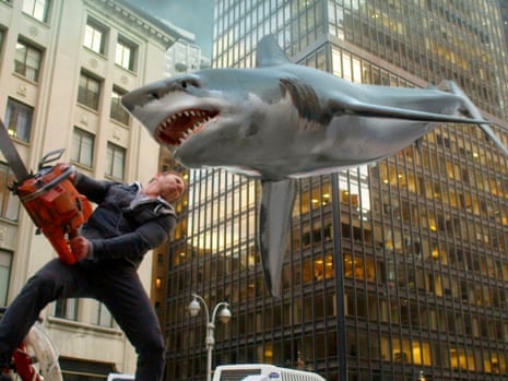 Ian Ziering, as Fin Shepard, battles a shark on a New York City street in Sharknado 2: The Second One