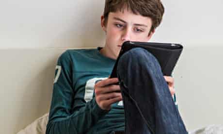 Teenager using tablet