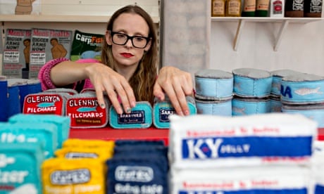 Artist Lucy Sparrow stocks the shelves of her felt corner shop in London