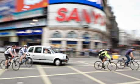 Cyclists in Piccadilly Circus, London