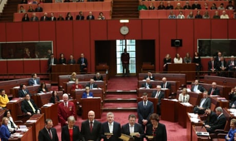 PUP Senator Ricky Muir joins fellow Victorians to be sworn in as the public galleries watch on.