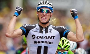 Germany's sprinter Marcel Kittel crosses the finish line to win stage three.