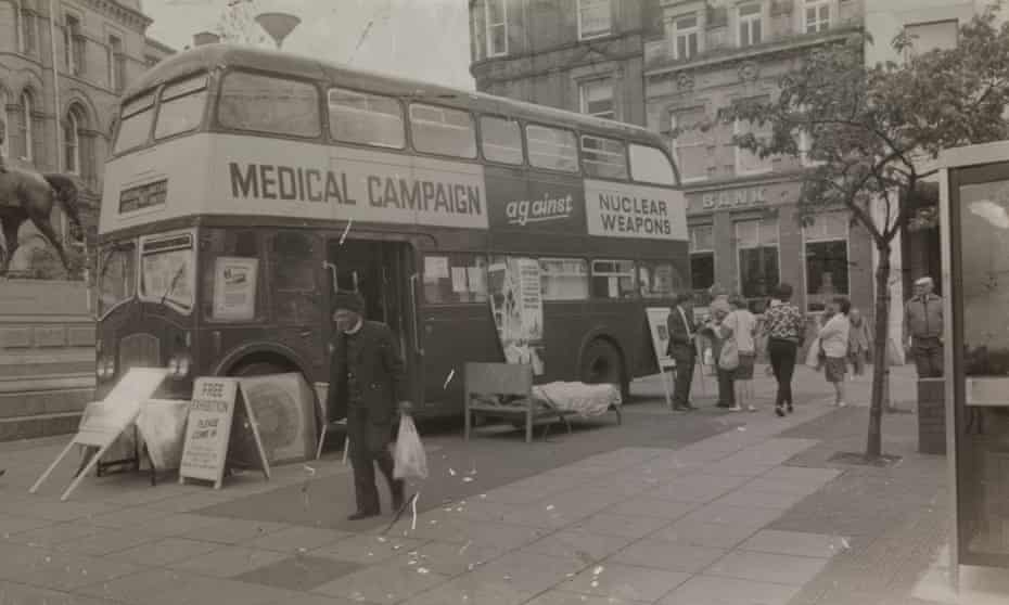 Medical Campaign Against Nuclear Weapons double decker bus in Birmingham, Chamberlain Square, 1980s.