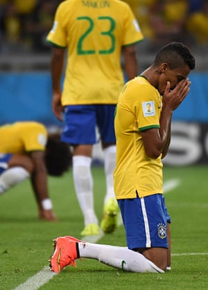 football: Brazil's midfielder Luiz Gustavo reacts