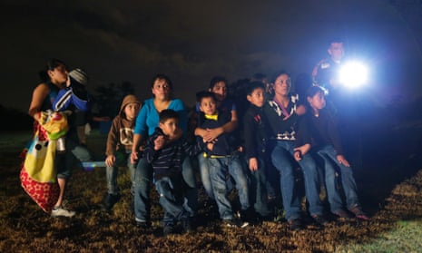 A group of immigrants from Honduras and El Salvador who crossed the US-Mexico border illegally are stopped in Texas.