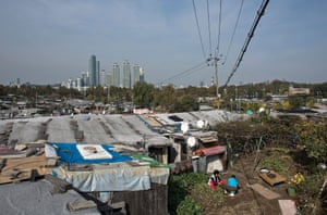 Guryong slum spreads out beneath the skyscrapers of Gangnam.