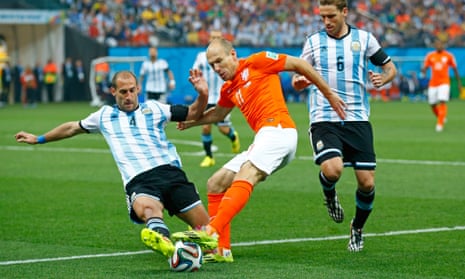 Pablo Zabaleta of Argentina challenges Arjen Robben during the World Cup semi-final.
