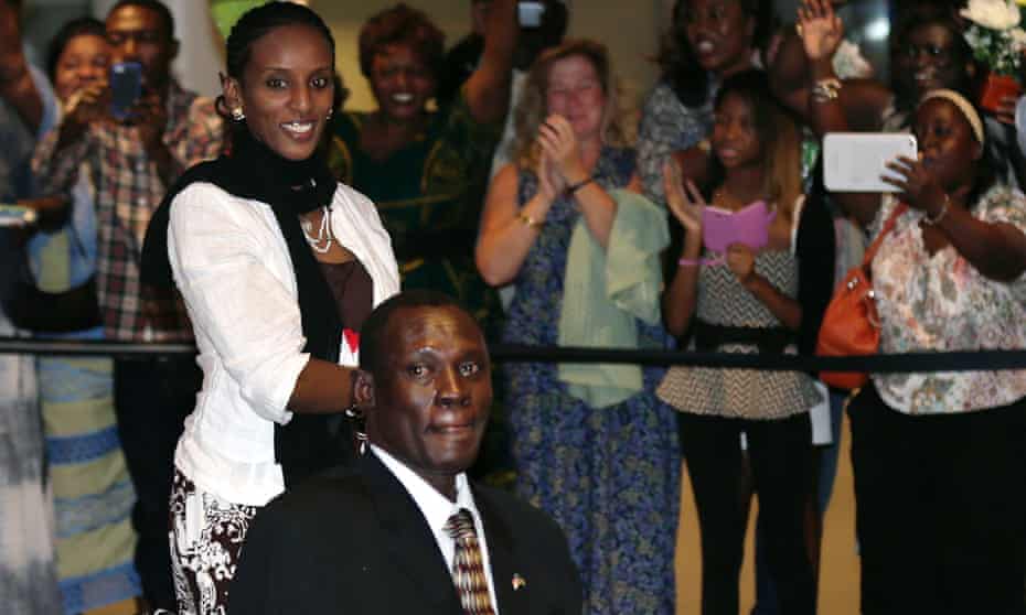 Meriam Ibrahim and her husband Daniel Wani are greeted as they arrive in the US.