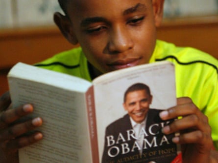 Ghanaian Felix Agyaba Afriyie reads Barack Obama's book ahead of the US president's trip to Africa in 2009.